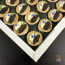 Load image into Gallery viewer, One tray contains 20 Blinis and Caviar. Order online our Luxury Gourmet Canapes
